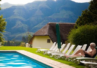 swim swimming pool mountains drakensberg relax peaceful tranquil champagne castle hotel